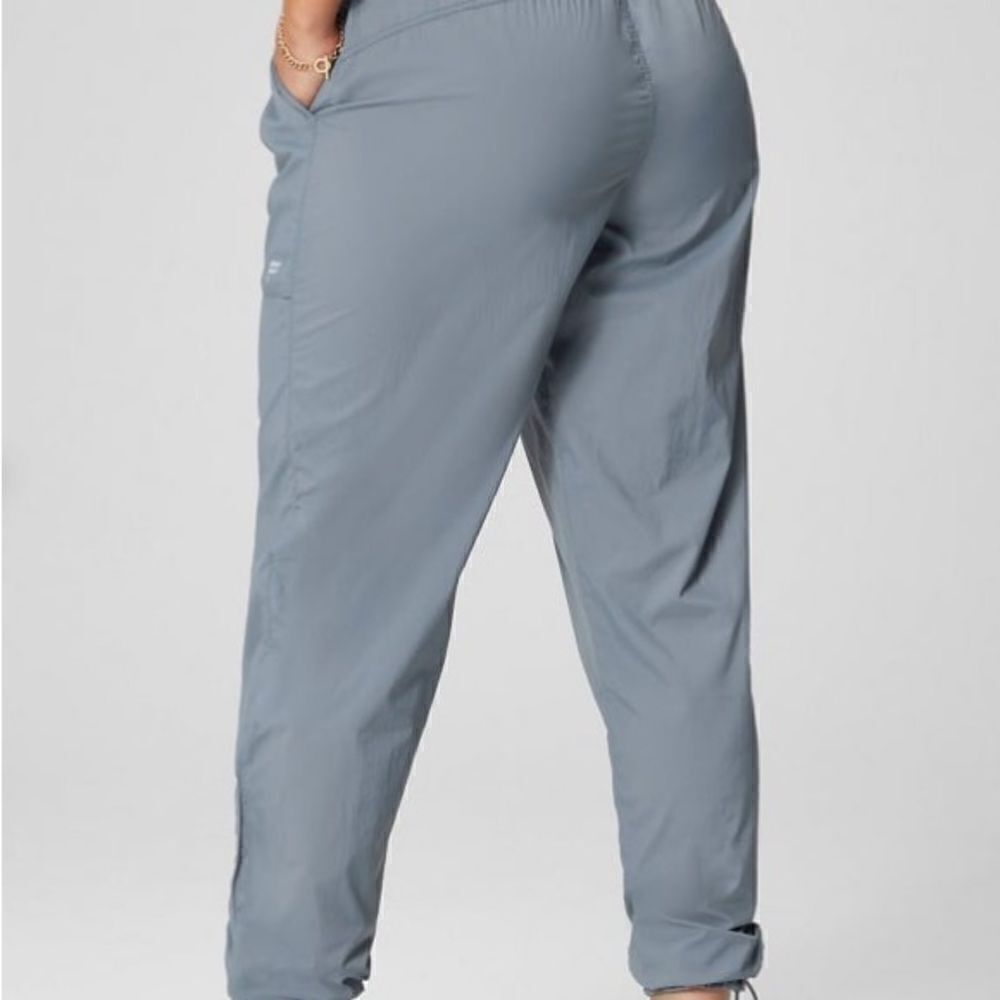 Fabletics Ultra High Waisted Piped Nylon Pants - Picture 3 of 10
